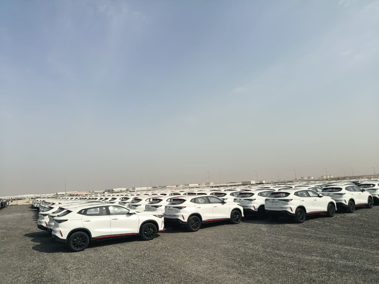 Fleet vehicles parked in the yard